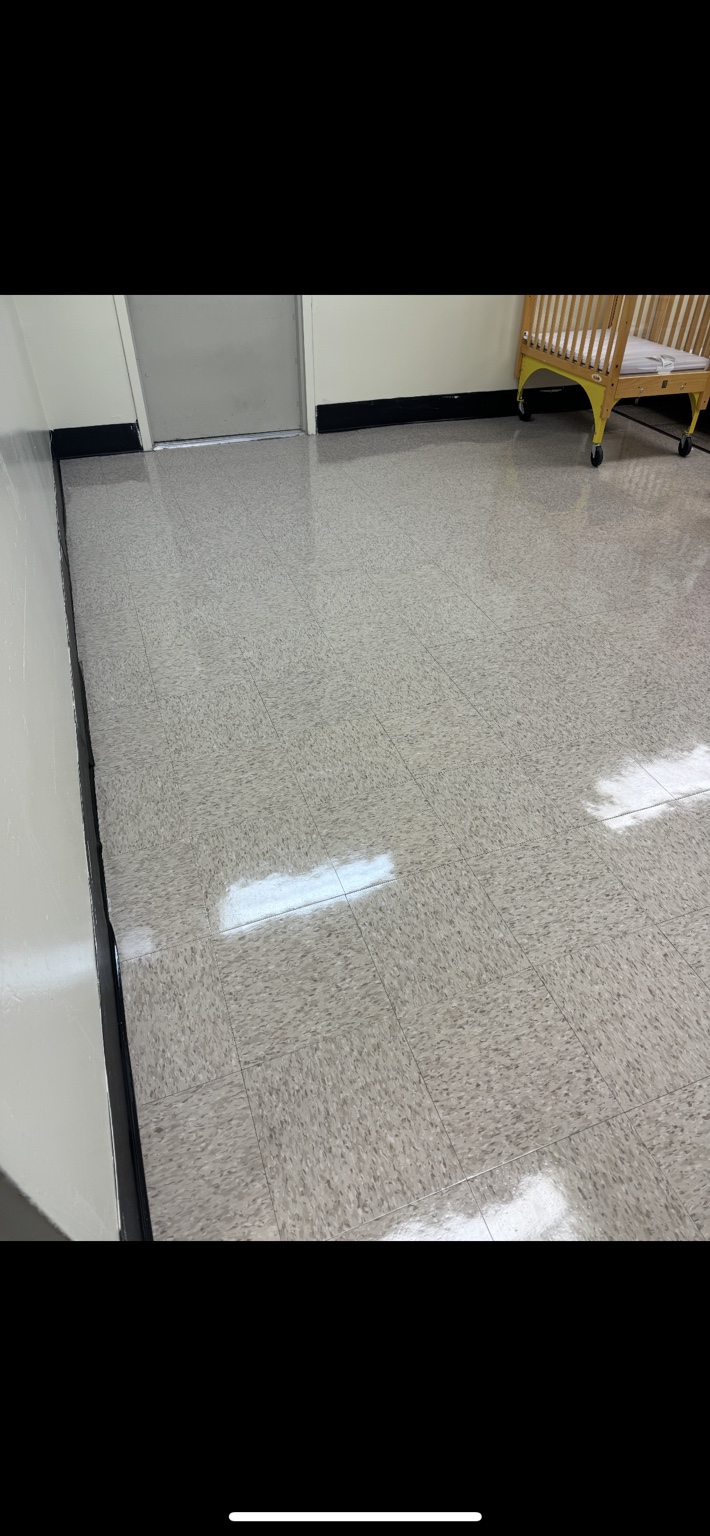 Finished reflective commercial VCT floor